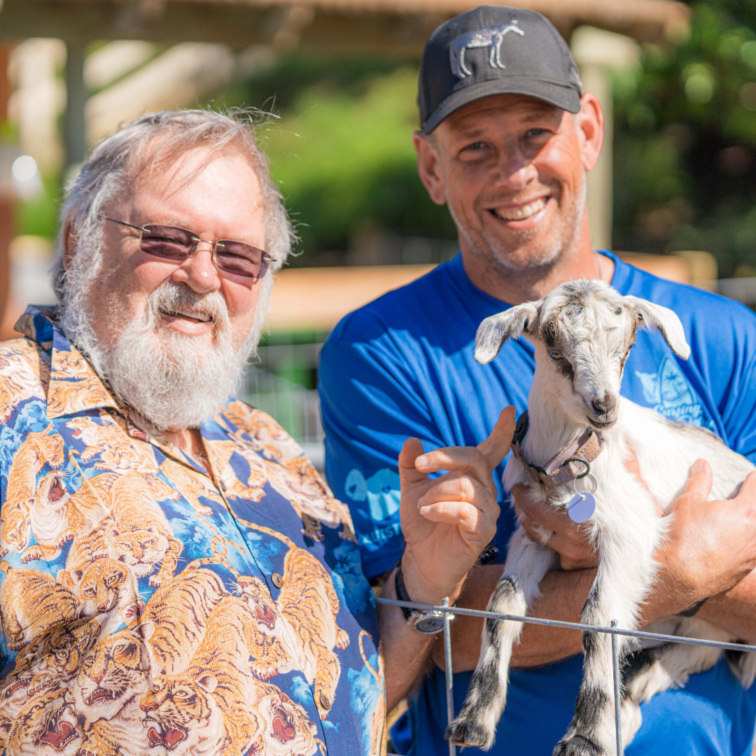 A picture of the previous owner and the new one of Surfing Goat Dairy, a goat farm on Maui offering daily tours, a new café and goat cheeses.